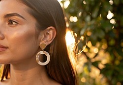 A model wearing a pair of earrings from my Elegant Collection.