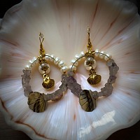 Beautiful hoop earrings with seashell accents with pearls and gems